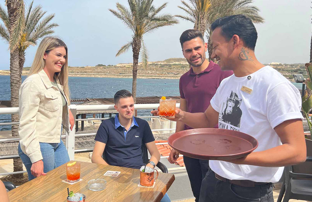 Friends having drinks on the terrace